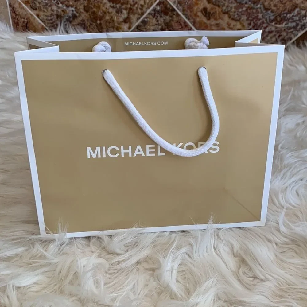 Tan and White Michael Kors Paper Shopping Bag